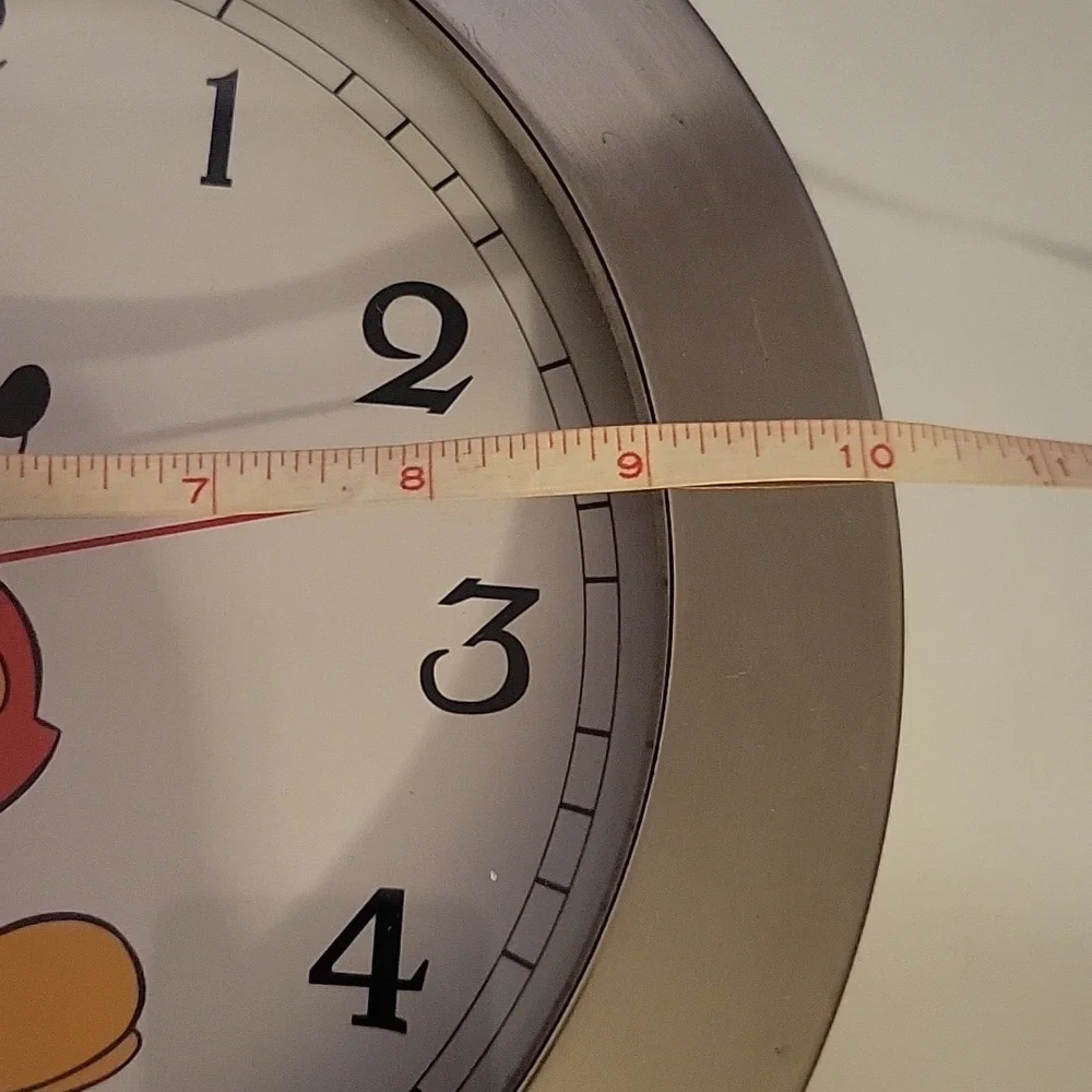 Disney clock for props or to fix.